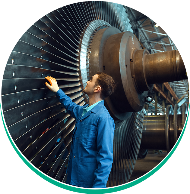 Technician checking out steam turbine